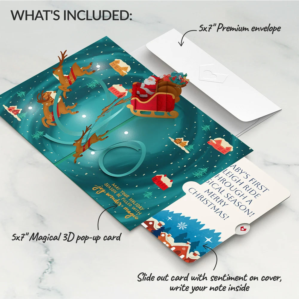 Magic of Christmas Santa's Sleigh Light-Up Pop-Up Card and Snow Village Sentiment Set for Baby